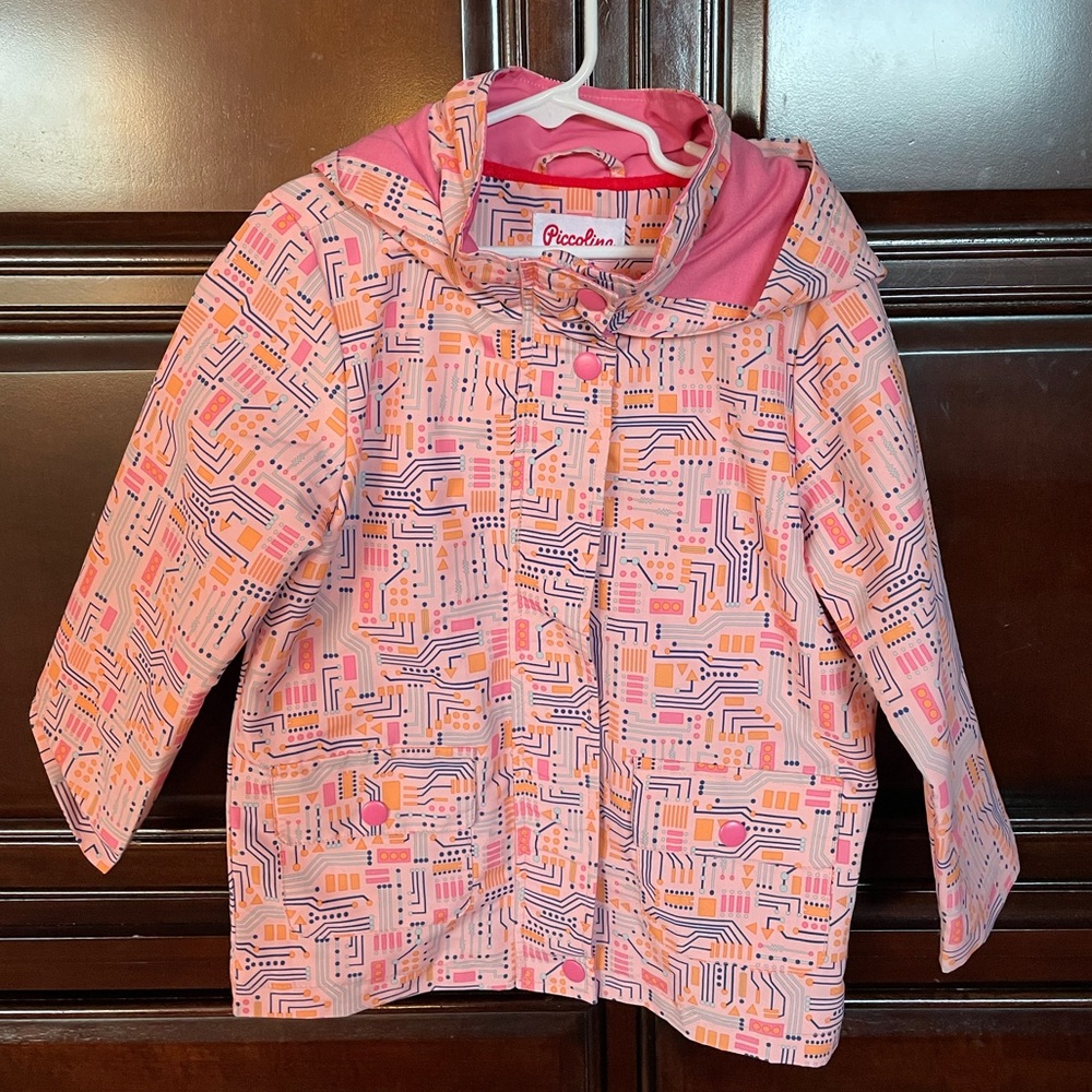 Piccolina hooded raincoat in circuitry pattern